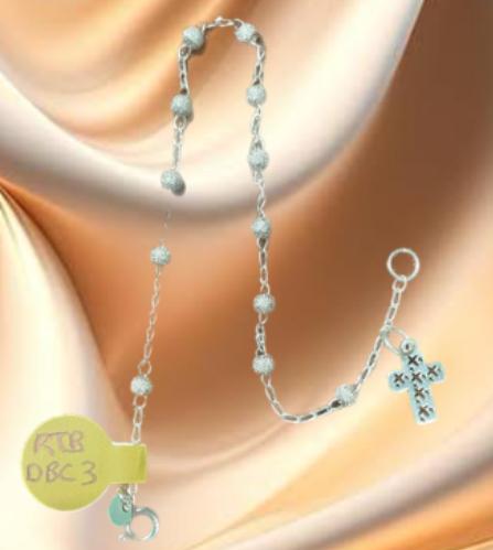 RELICARIO TEJIDO DE BOLITAS DIAMANTADAS Y DIJE DE CRUZ